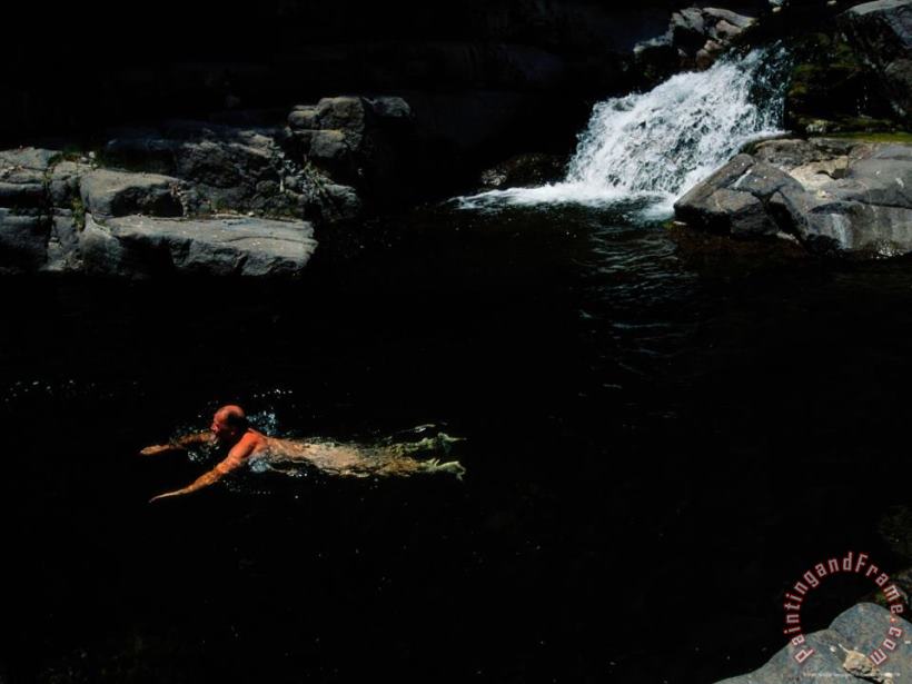 Raymond Gehman A Man Taking a Dip in a Creek Fed Pool in The Gila Wilderness Area Art Print