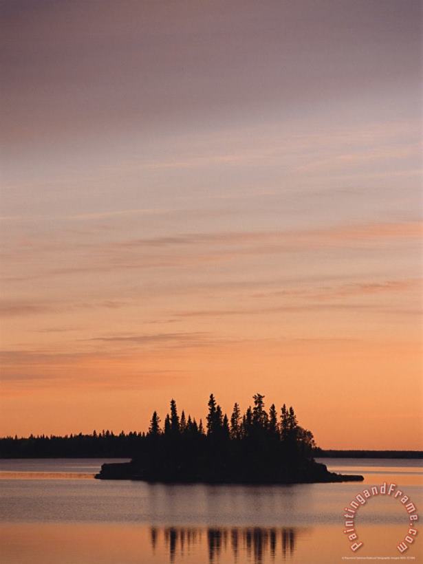 Raymond Gehman An Island in Rocky Lake Silhouetted Against The Evening Sky Art Print
