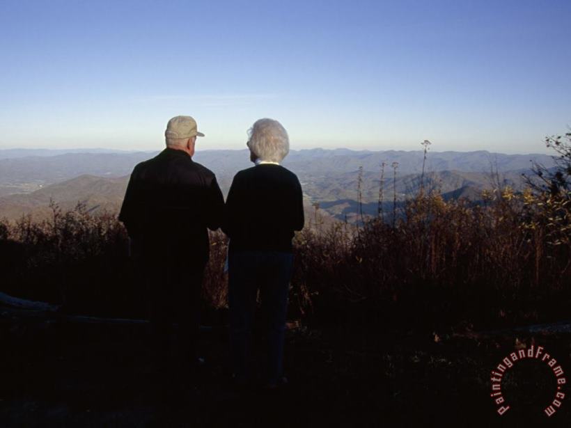 An Old Couple Taking in a Scenic View From Wayah Bald at Dusk painting - Raymond Gehman An Old Couple Taking in a Scenic View From Wayah Bald at Dusk Art Print