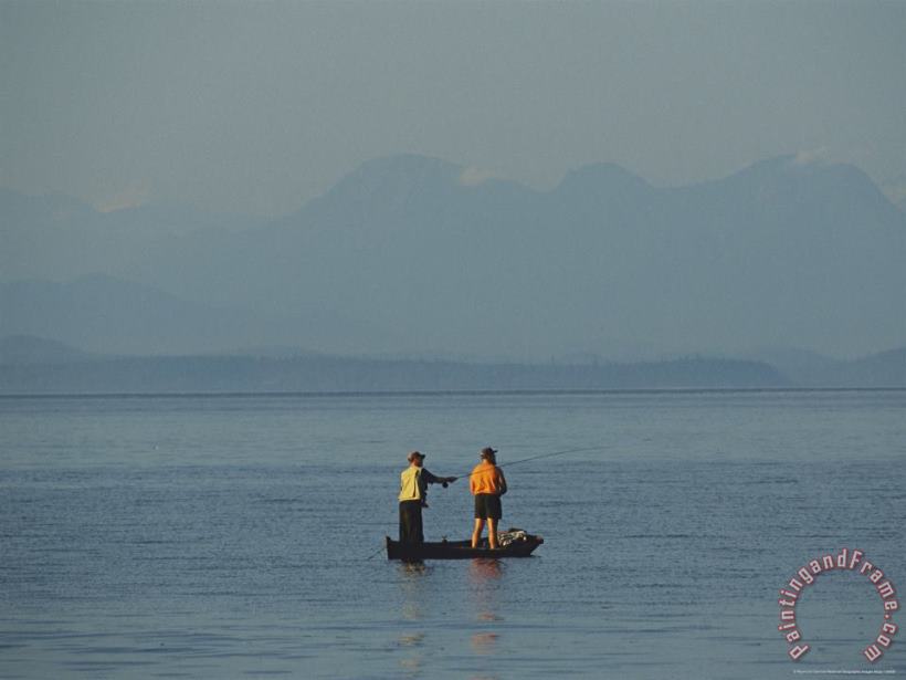 Raymond Gehman Fishermen in a Boat Cast Lines Within Sight of a Hazy Mountain Art Print