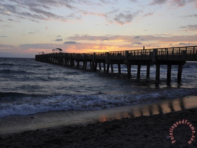 The Sun Rises Over an Atlantic Ocean Pier painting - Raymond Gehman The Sun Rises Over an Atlantic Ocean Pier Art Print