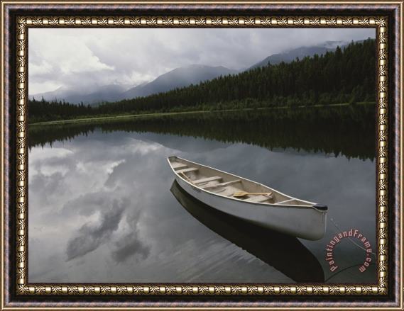 Raymond Gehman A Canoe Sits Tethered to Shore on a Beautiful Mountain Lake Framed Painting
