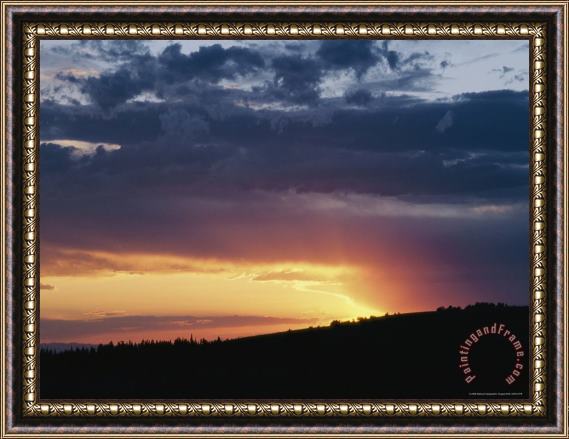 Raymond Gehman A View of a Sunset Over Bighorn National Forest Framed Print