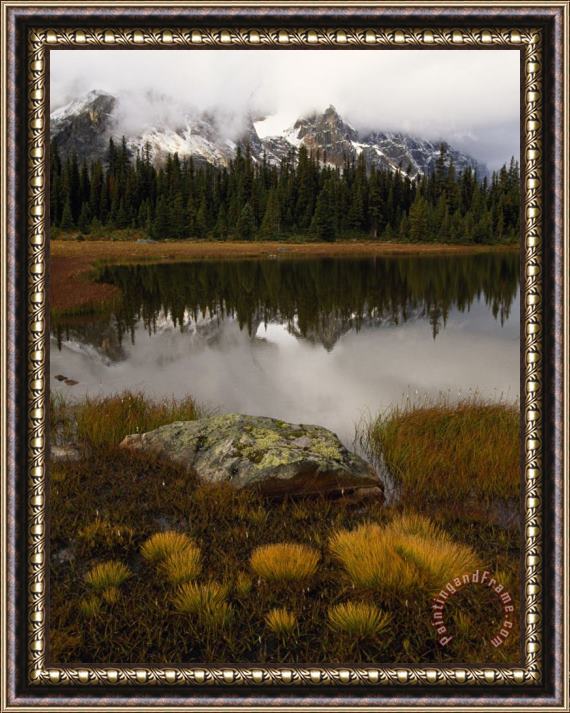 Raymond Gehman Dusted with Snow The Ramparts Tower Above Spruce Fringed Moat Lake Framed Print