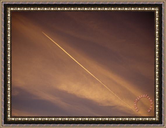 Raymond Gehman Jet Vapor Trails in The Sky at Twilight Framed Print