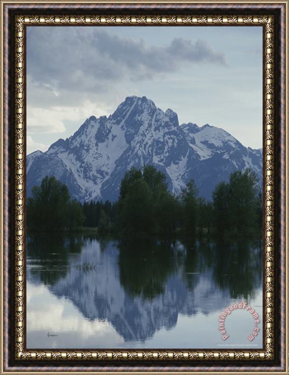 Raymond Gehman Snow Covered Mount Moran Is Reflected in Flooded Pilgrim Creek Framed Print