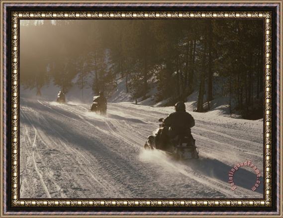 Raymond Gehman Snowmobilers in Yellowstone National Park Wyoming Framed Painting