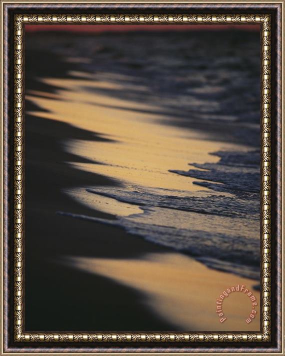 Raymond Gehman Surf Gently Lapping on a Sandy Beach at Twilight Framed Painting