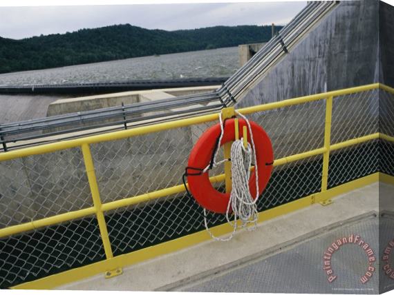Raymond Gehman A Life Preserver Hangs on a Fence at The Holtwood Hydroelectric Dam Stretched Canvas Painting / Canvas Art
