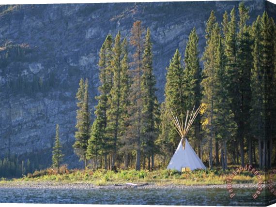 Raymond Gehman A Tepee Is Built on The Edge of Cli Lake Stretched Canvas Painting / Canvas Art