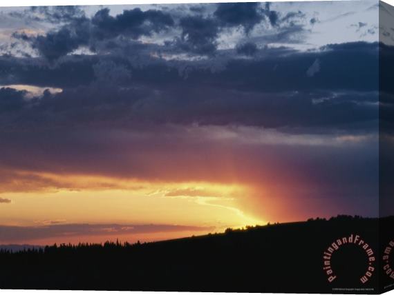 Raymond Gehman A View of a Sunset Over Bighorn National Forest Stretched Canvas Print / Canvas Art