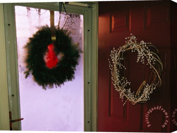 Raymond Gehman Christmas Wreaths Hanging on The Storm And Front Doors of a House Stretched Canvas Print / Canvas Art