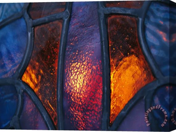 Raymond Gehman Sunset Illuminates a Stained Glass Window of a Church Stretched Canvas Print / Canvas Art