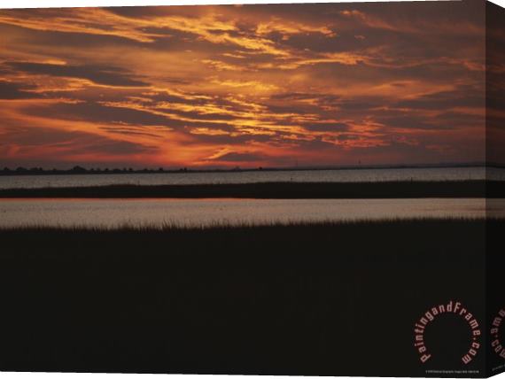 Raymond Gehman Sunset Over a Salt Marsh with Cordgrass Stretched Canvas Print / Canvas Art