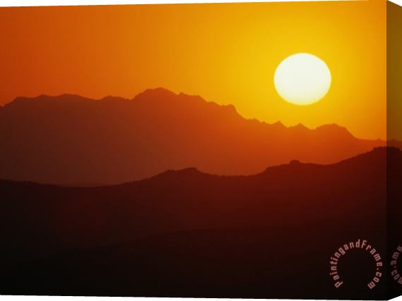 Raymond Gehman Sunset Over Silhouetted Mountain Ridges Stretched Canvas Painting / Canvas Art