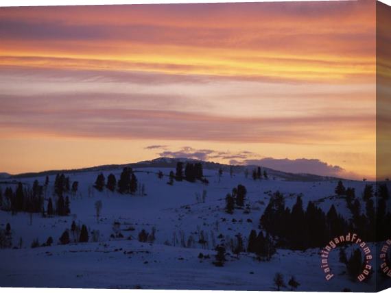 Raymond Gehman Sunset Sky Over Snowy Hills Cast in Shadow Stretched Canvas Print / Canvas Art